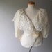 Peplum Wrap Blouse . Ivory. Scalloped Lace . Balloon Sleeve . nwt