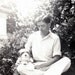 vintage photo young man w his Cockapoo Dog in Lap
