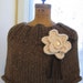 Warm Brown knit capelet Cream flower brooch. Welcome Home.