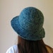 Cloche Hat Knitted in Tweed Teal Blue