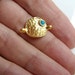 Gold plated hammered circle with blue , pendant, connector-1