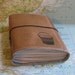 bucket list journal with world atlas maps as travel journal