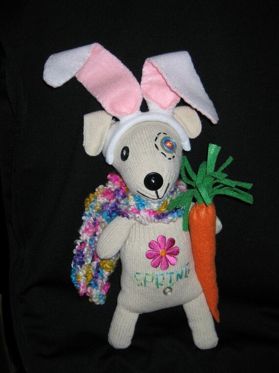 stuffed dog with bunny ears