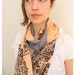 Infinity scarf in silk, geometric primitive print, bright colors orange pink, gray and purple