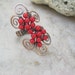 red coral swirl ring in copper