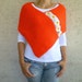 Tangerine Orange Poncho with Daisy Motifs