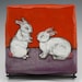 Love Bunnies "Stuck on the Wall" Ceramic Wall Tile Illustration