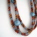 Multicolored knitted necklace, blue wooden beads, chunky statement necklace, fiber jewelry, gray, orange