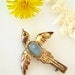 Fly Through My Window - Antique Sterling Silver and Gold Swallow Bird Brooch with Blue Jelly Belly Stone