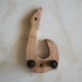 Unique ukulele wall mount hanger, Hawaiian fish hook.