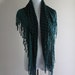 blue pattern scarf with tassel fringe all over