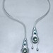 Fluidity neck piece