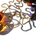 YOU PUZZLE ME Earrings. Orange Seascapes. Forged Brass Wire. Large Yellow & Honey Brown Glass Drops.Upcycled Jigsaw Puzzle Piece. tagt team