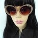 REDUCED TO CLEAR 60s Oval Space age style reproduction sunglasses in glossy nude