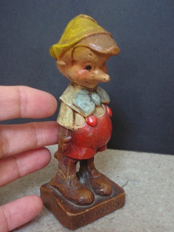 enchanting disney little wooden head pinocchio figurine