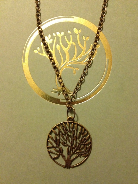 Items similar to Insurgent inspired antique bronze plated necklace on Etsy