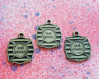 Our Heroes Charms --4 pieces-(Antique Pewter Silver Finish)--style 898-