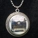 Pop culture necklace: "Well, she lives for the written word"