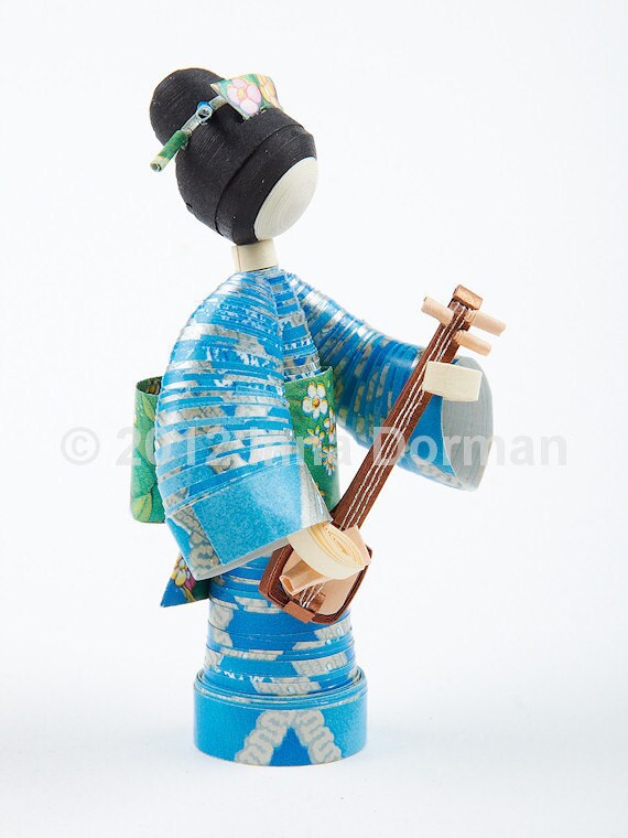Japanese paper doll with a shamisen. Collectible one of a