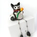Cute Puppy Dog with a Flower (Dangling Legs) - Miniature Sculpture from Polymer Clay (Sculpey)