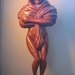 Hand carved cherry wood statue, very fine artwork made out of one piece of wood,