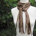 Ribbon yarn scarf in browns, gold and butter yellow