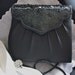 Vintage elegant black evening bag. Black sequins, corded strap amd magnetic snap.