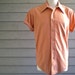 vintage 70s men's short sleeve shirt in peach nylon by Van Heusen. 1970s button down top. retro clothing.