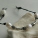 Leather pearl bracelet, white freshwater pearls, silver tube bead accents