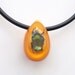 Orange lucite necklace with real metallic insect