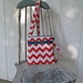 New Crossbody small travel bag purse in Orange Chevron with teal zipper accents