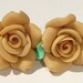 small honey tan with green leaves polymer clay rose pierced post earrings