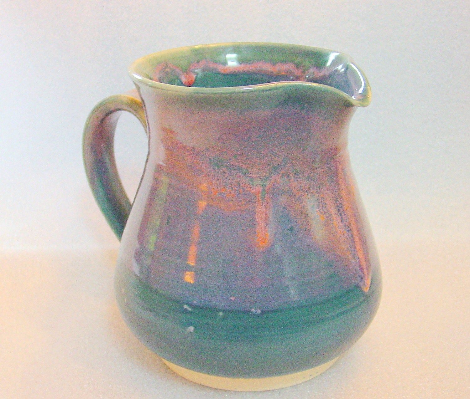 Wheel Thrown Pottery Pitcher in Teal and Pink