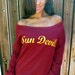 YOUR TEAM Off the Shoulder Boxy Sweatshirt by Firedaughter