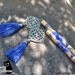 And Tassels -- 9" long hair sticks with blue tassels and silver