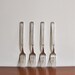 Set of 4 vintage forks, hotel silver