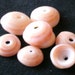 Authentic Hawaiian Puka shell, VERY RARE ORANGE with natural hole for jewelry. Lot8PO
