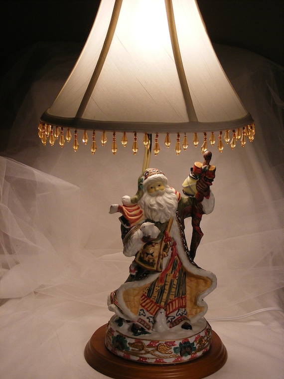 Santa Claus Christmas table lamp with white beaded lampshade