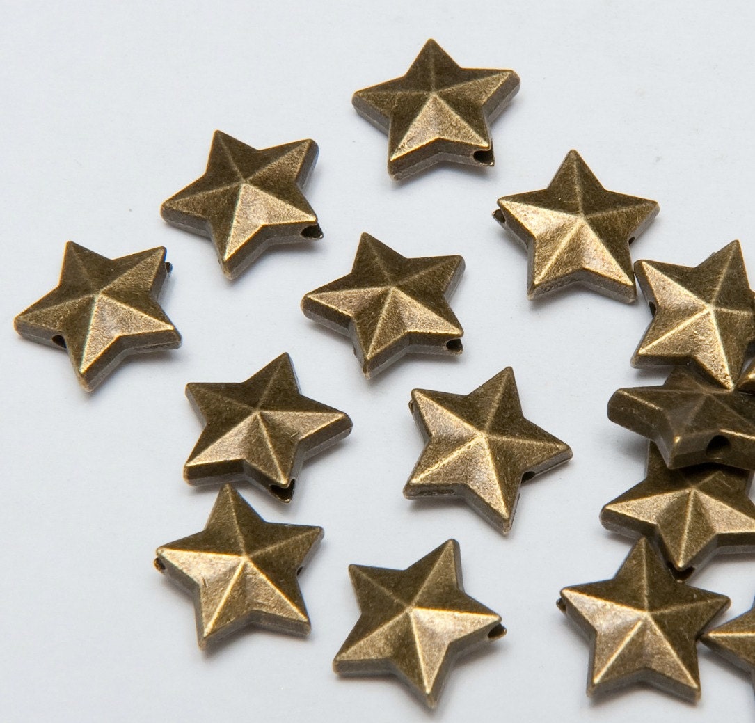 32 Five Point Star Beads in Antiqued Brass Tone Lead/Nickel