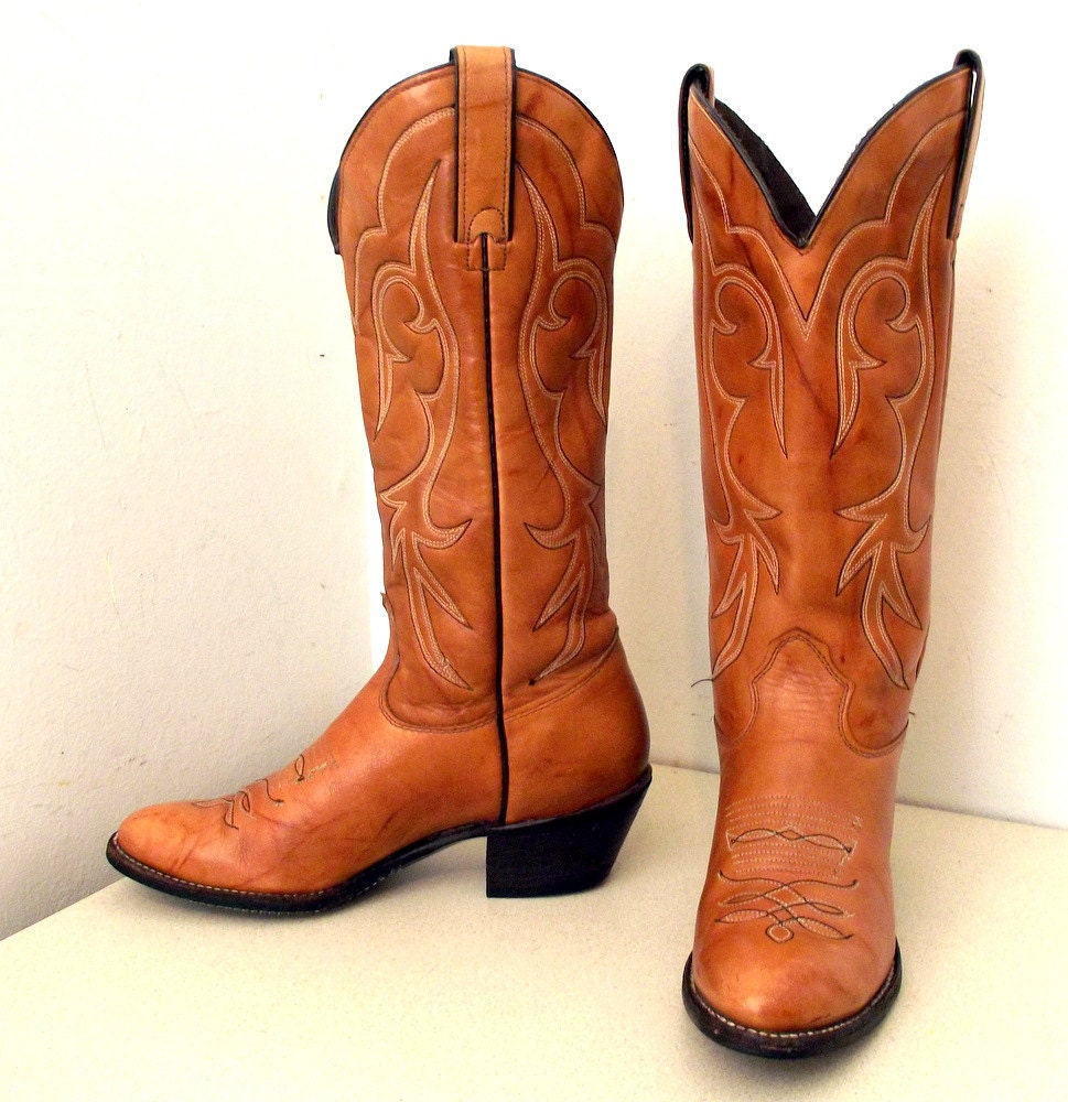 Vintage Kenny Rogers light tan leather cowboy boots in a