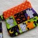 Medium Curvy Wristlet ...Halloween Hello Kitty Mummy