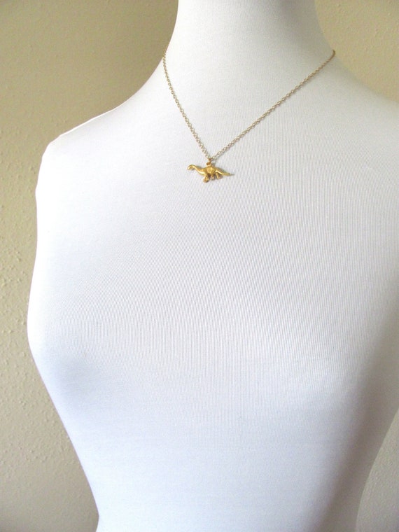 Gold dinosaur charm necklace on 14k gold plate chain 18k gold