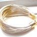 50% off SALE - White Leather Cuff Bracelet with Gold Tube Beads - Multi Strand Bangle Women's Bracelet ... by B A L O O S