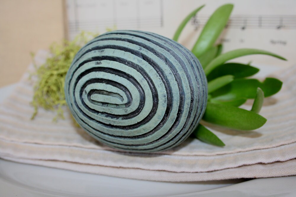 Decorative ceramic sphere with carved spiral by HouseOfCeramics