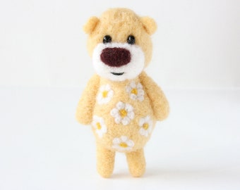 Cream yellow pocket bear with daisies and a brown nose 55