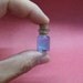 A tiny jellyfish in a tiny bottle L / Up side down version