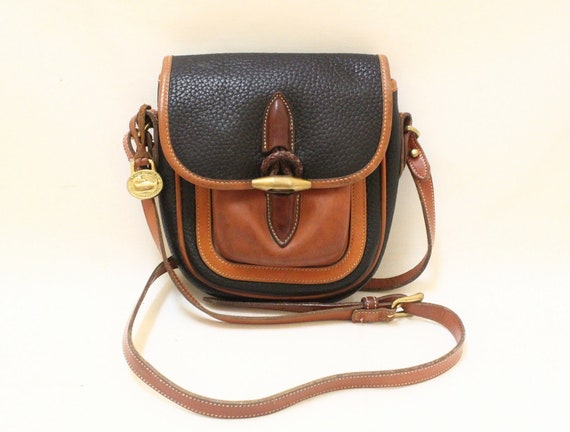 Dooney and Bourke Navy Pebble leather and Tan Color by grassdoll