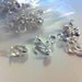 50 Silver Plated Clamshell Knot Covers