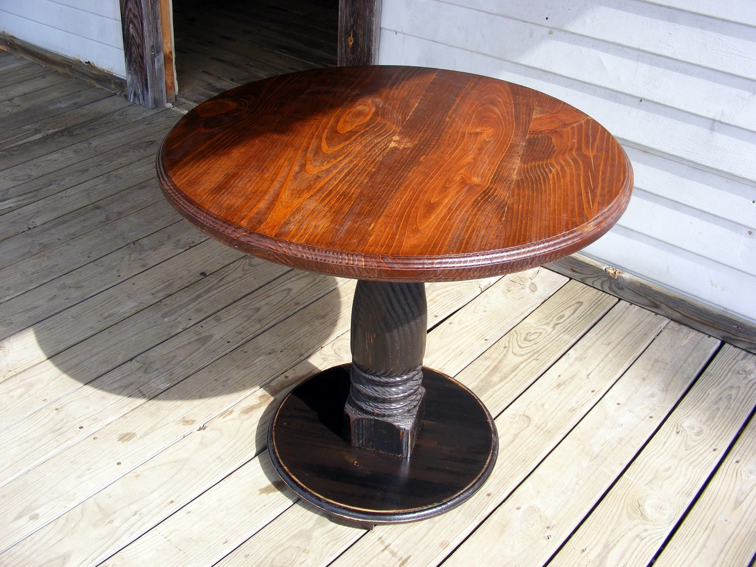Handcrafted Pedestal Table With Distressed Black Pedestal and
