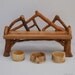 Nature Display Shelf with Bent Twigs and collection bowls